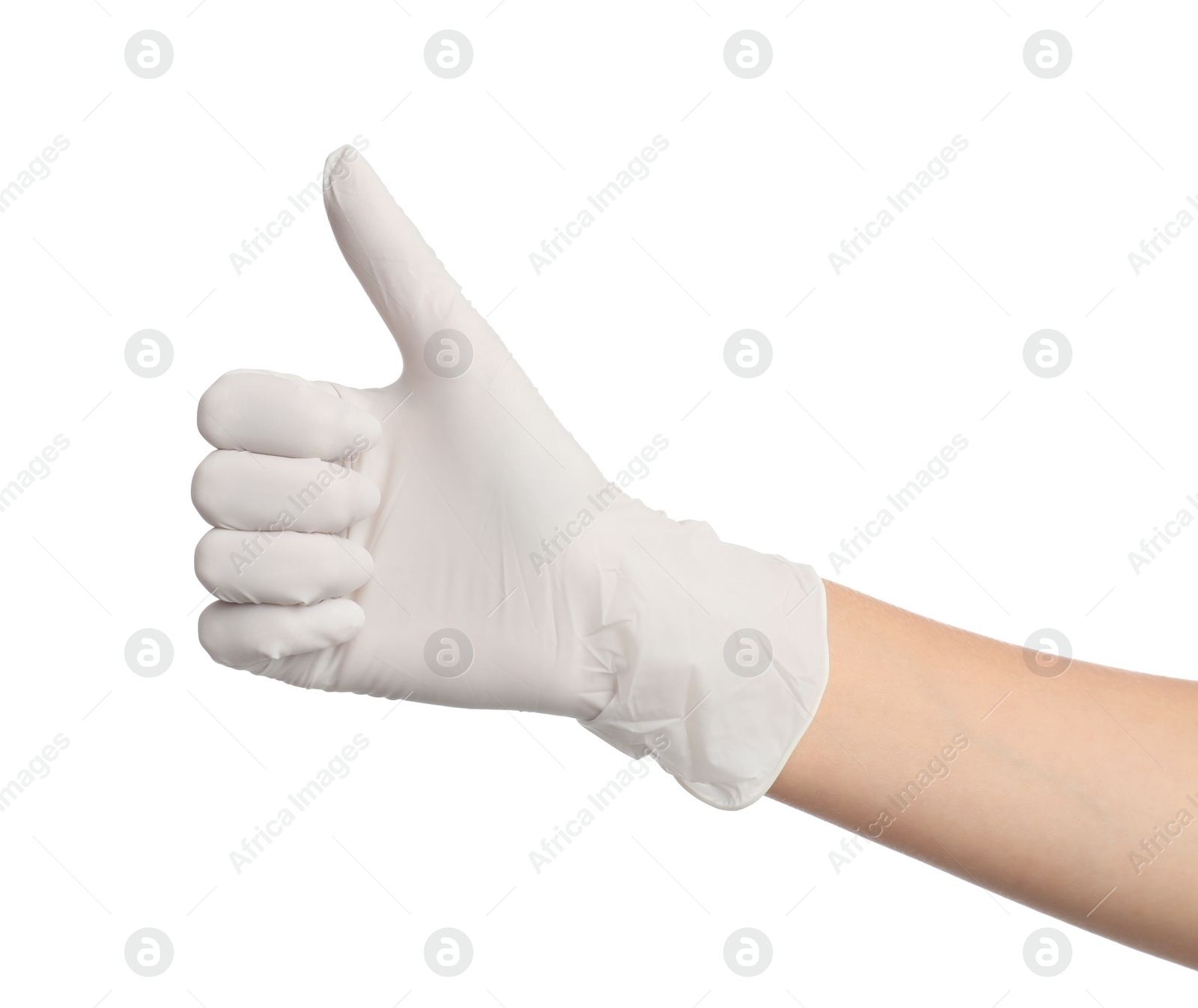 Photo of Doctor in medical gloves showing thumb up on white background, closeup