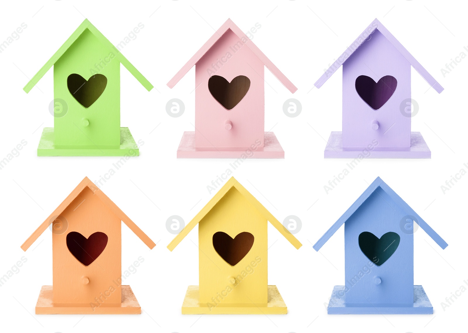 Image of Set with different colorful bird houses on white background 