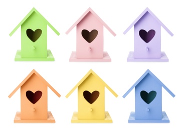 Image of Set with different colorful bird houses on white background 