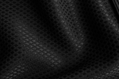 Photo of Textured black fabric as background, closeup view