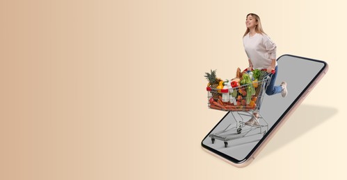 Image of Online purchases. Woman with shopping cart full of different products running out from smartphone on beige background. Banner design with space for text