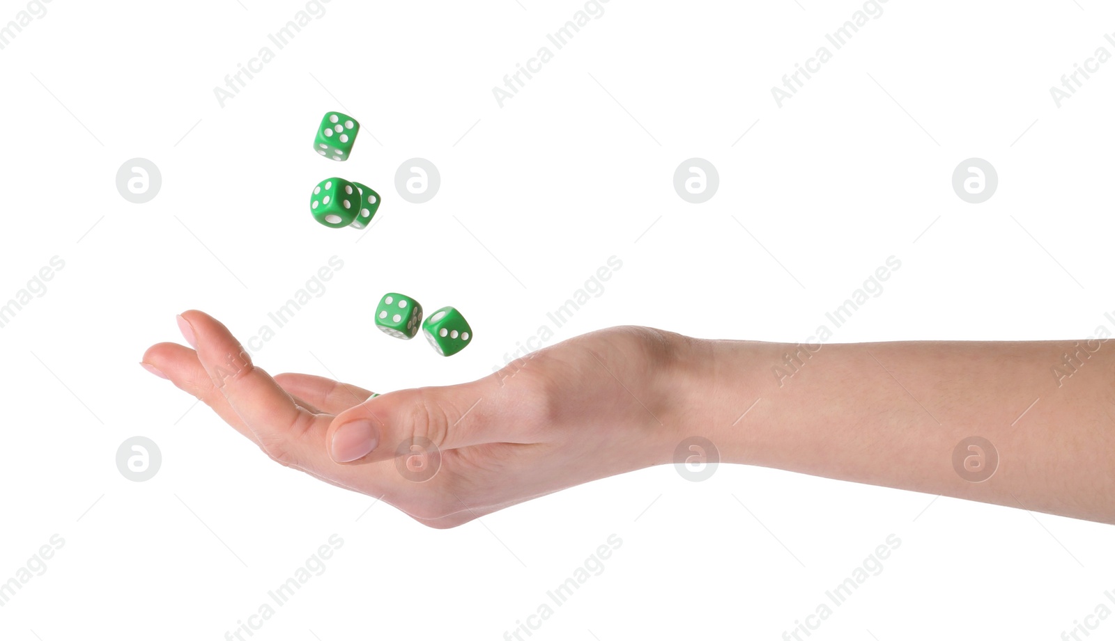 Photo of Woman throwing game dices on white background, closeup