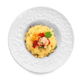 Plate with tasty shrimps and grits on white background, top view