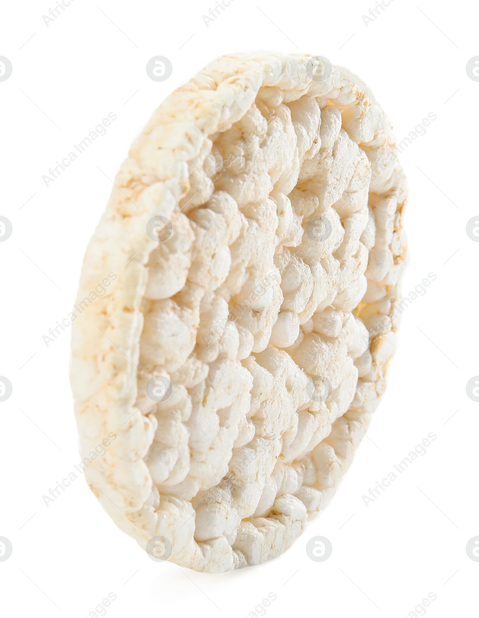 Photo of Puffed rice cake isolated on white. Healthy snack