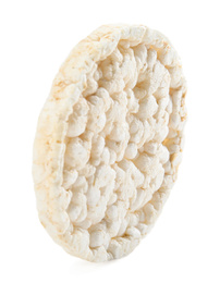 Photo of Puffed rice cake isolated on white. Healthy snack