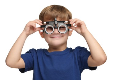 Photo of Vision testing. Little boy with trial frame on white background