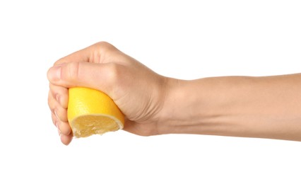 Photo of Woman squeezing lemon half on white background, closeup