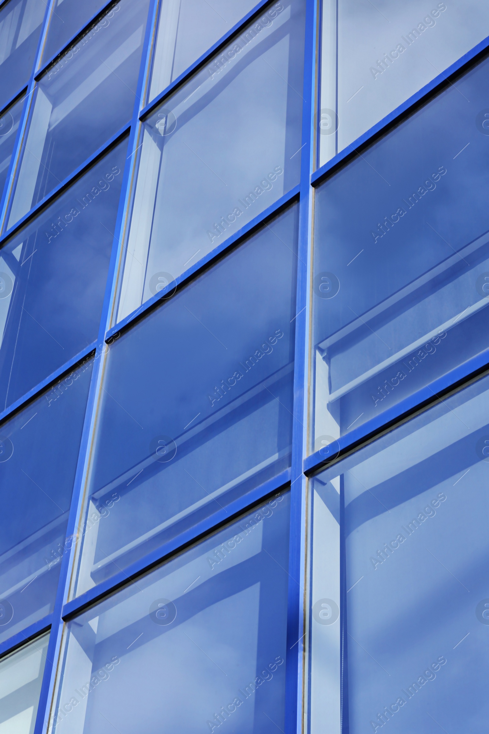 Photo of Modern office building with tinted windows. Urban architecture