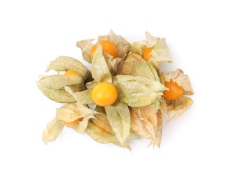 Many ripe physalis fruits with calyxes isolated on white, top view