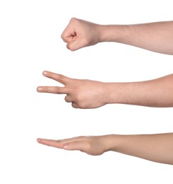 People playing rock, paper and scissors on white background, closeup