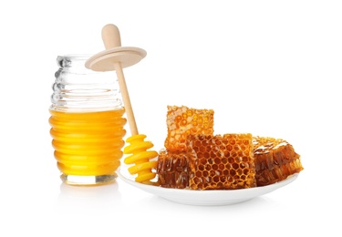 Photo of Composition with jar of honey on white background