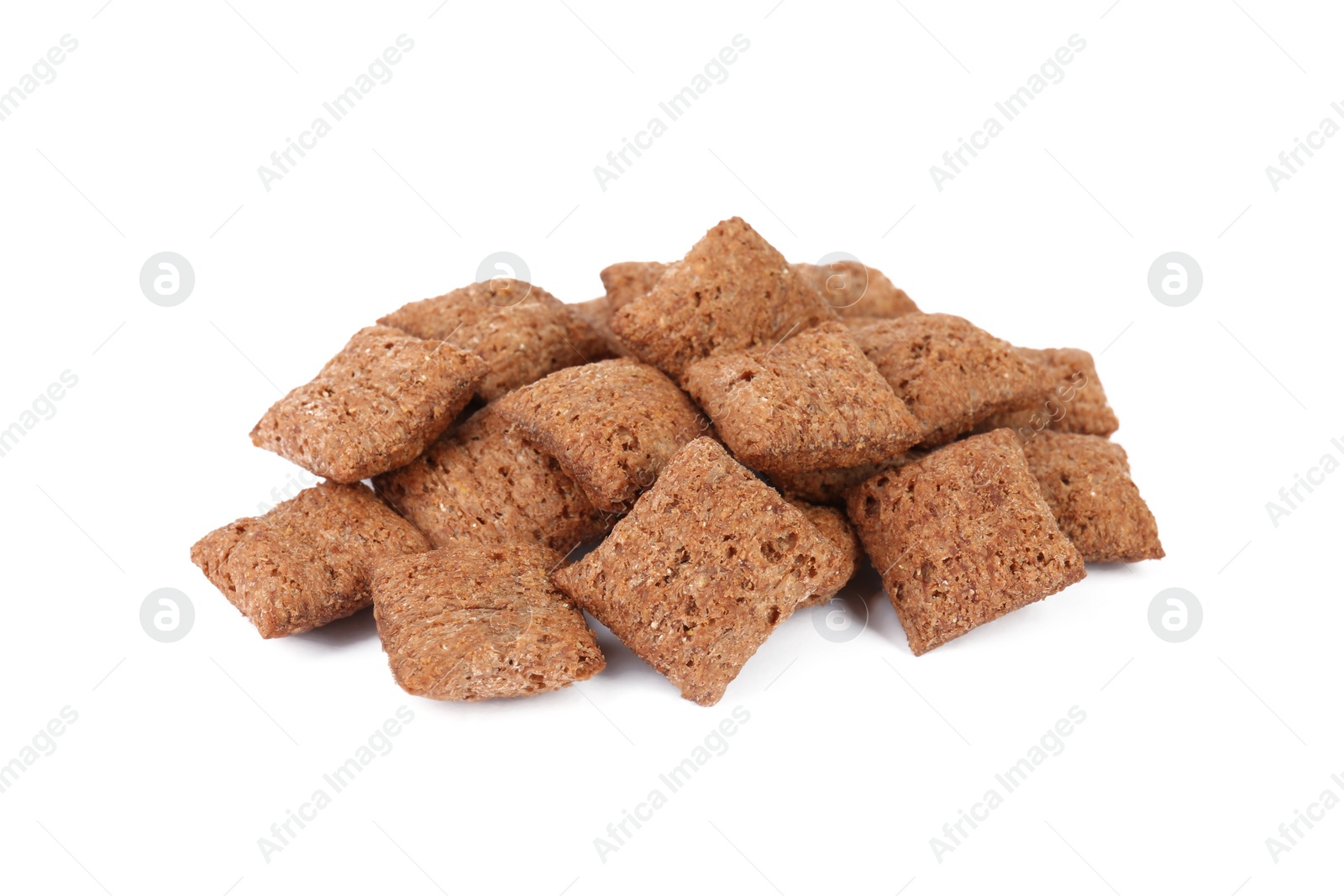 Photo of Heap of sweet crispy corn pads on white background. Breakfast cereal