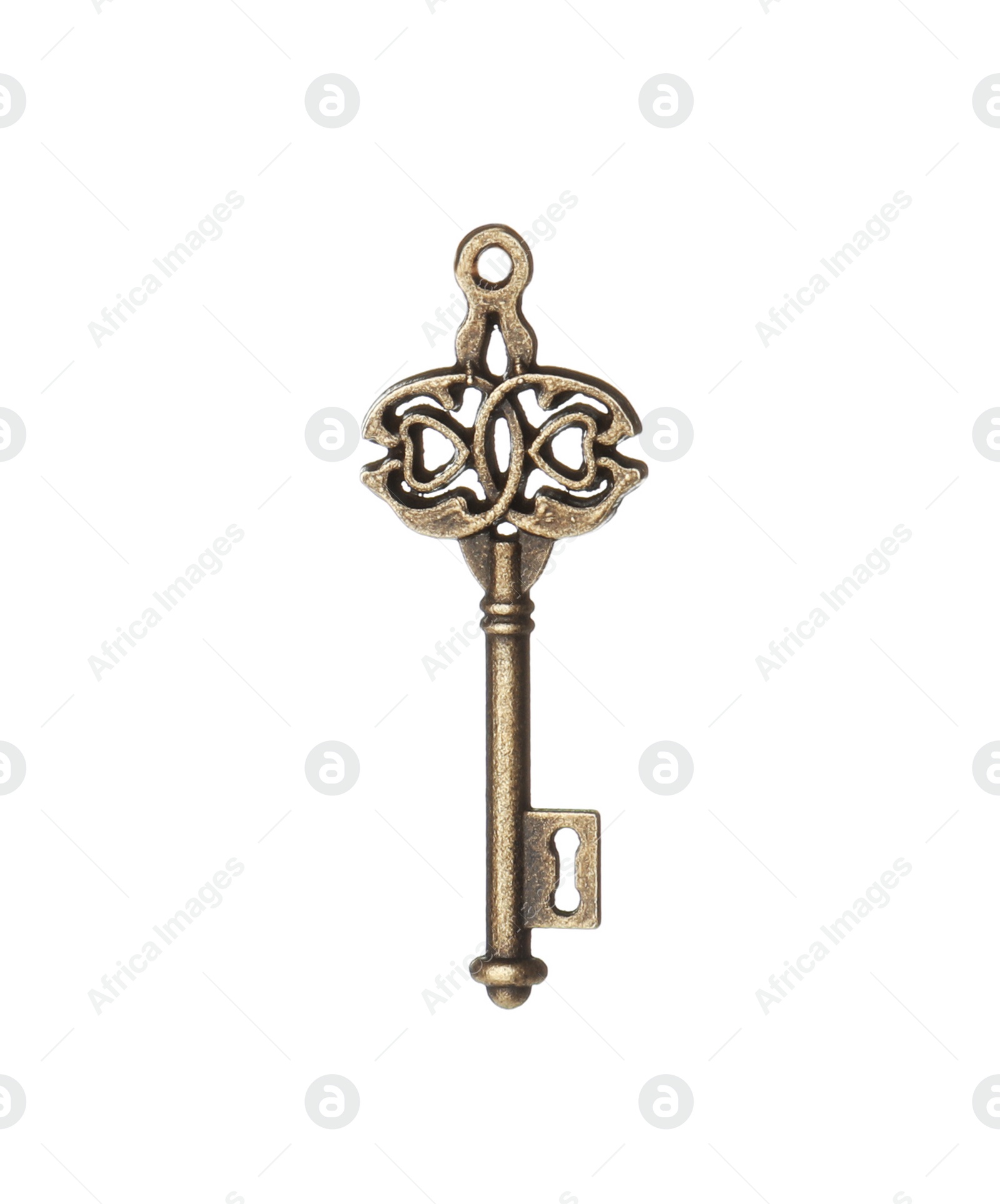 Photo of Bronze vintage ornate key on white background