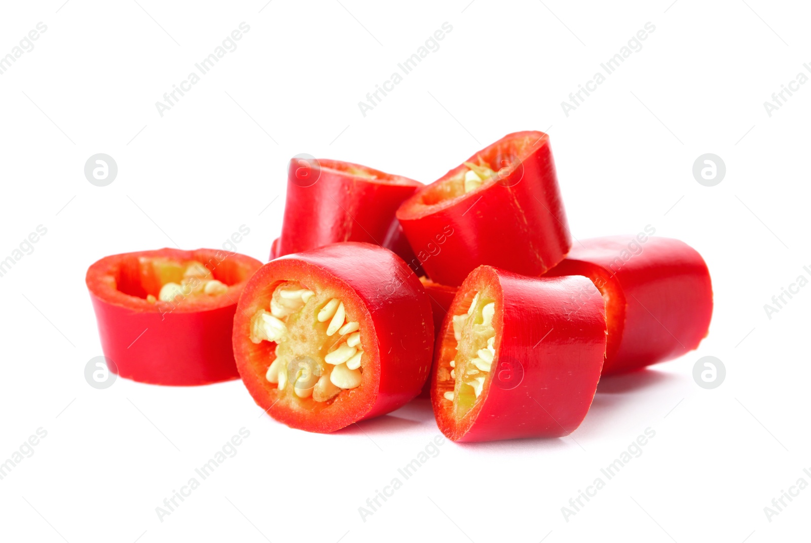 Photo of Slices of red chili pepper on white background