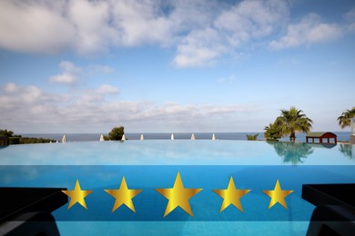Image of Beautiful view of outdoor swimming pool at five star hotel 