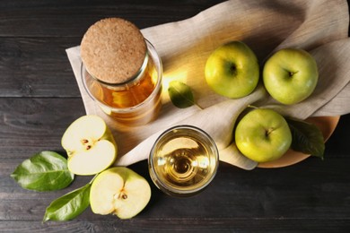 Flat lay composition with delicious apple cider on wooden table