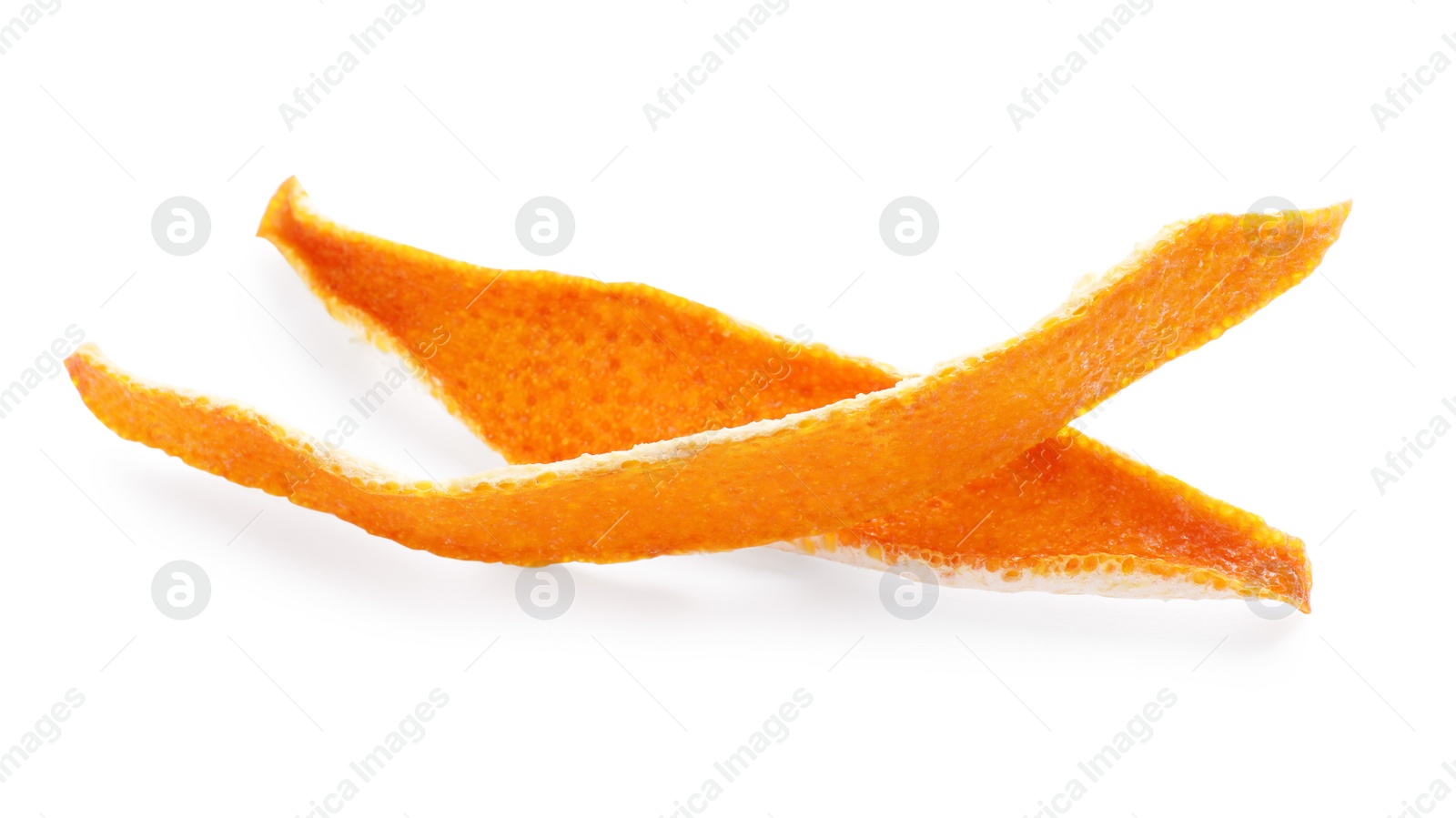 Photo of Dry orange fruit peels on white background, top view