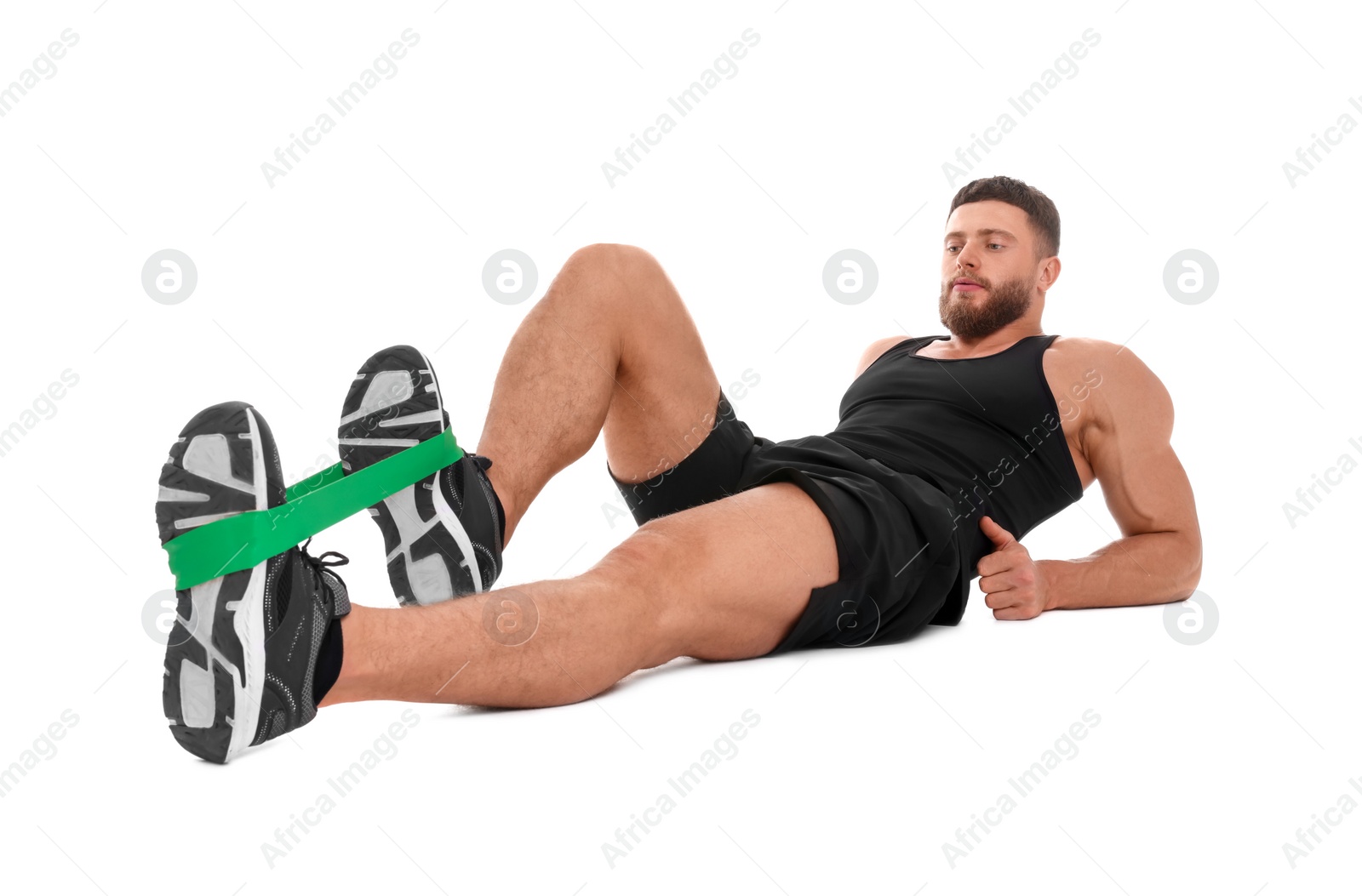 Photo of Young man exercising with elastic resistance band on white background