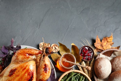 Flat lay composition with turkey on grey background, space for text. Happy Thanksgiving day