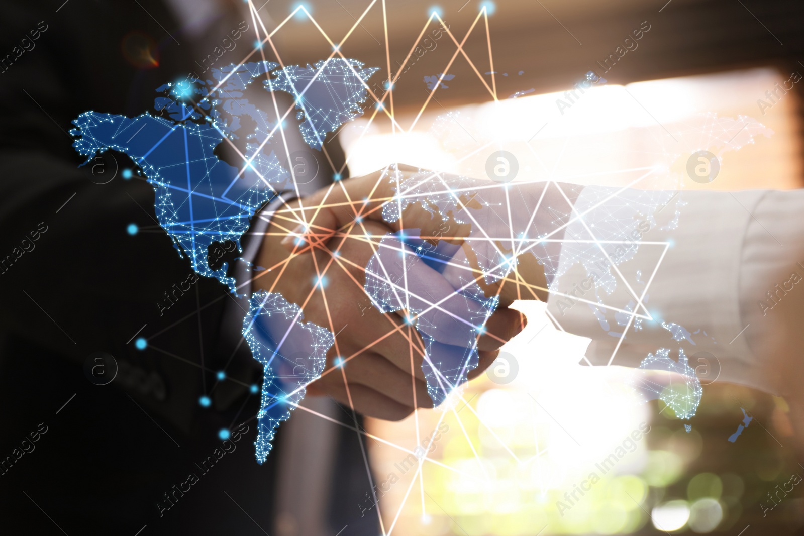 Image of Global network technology. Business people shaking hands in office, closeup