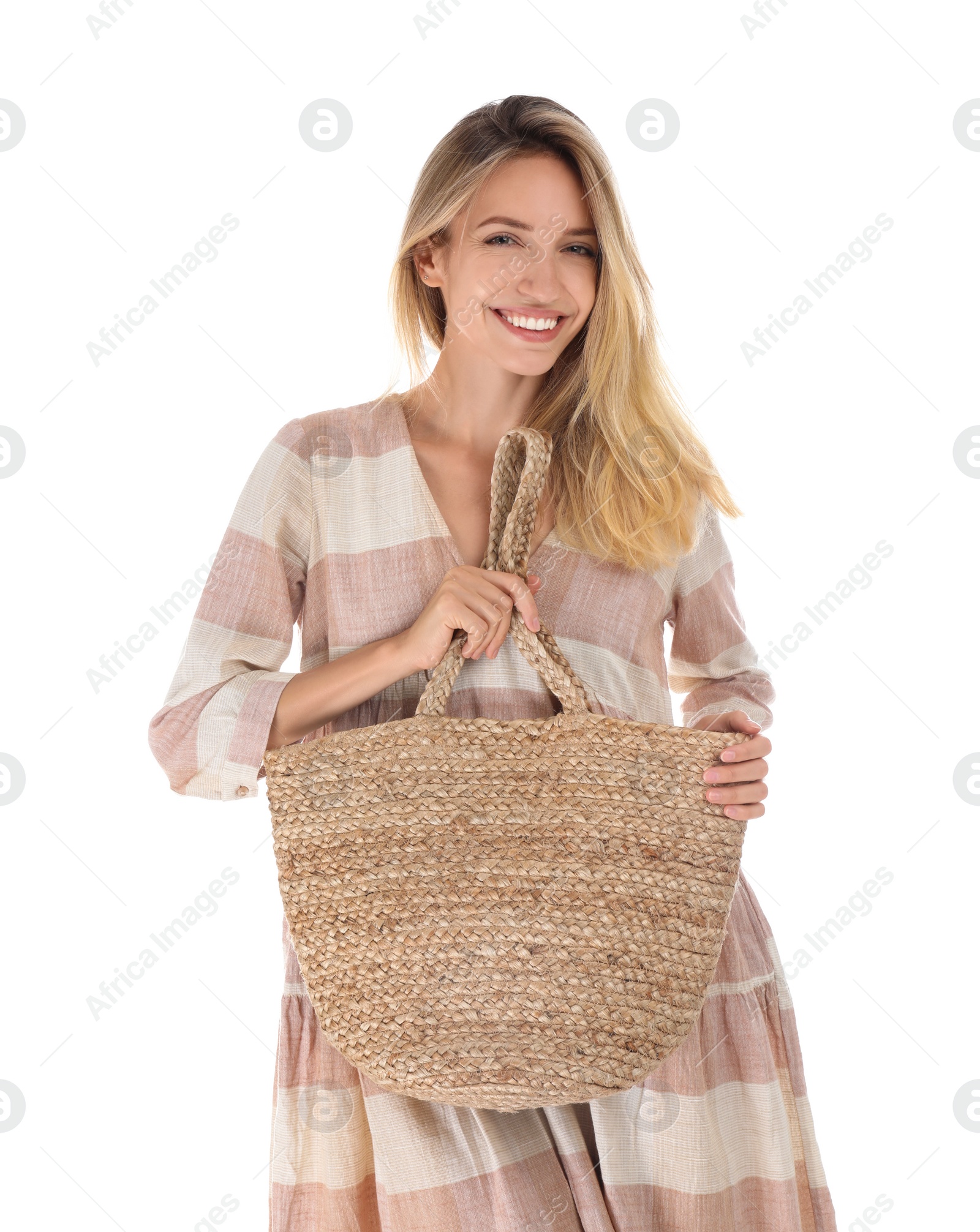 Photo of Beautiful young woman with stylish straw bag on white background