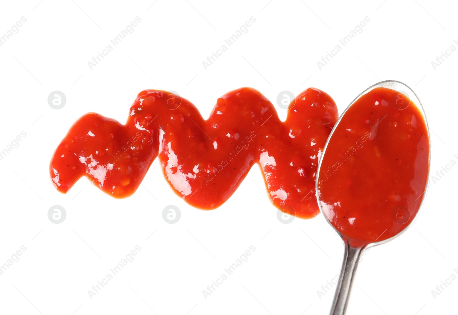 Photo of Delicious tomato sauce and spoon on white background, top view