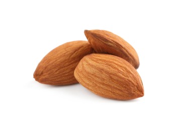 Photo of Organic almond nuts on white background, closeup. Healthy snack
