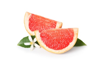 Photo of Grapefruit slices, leaves and citrus flower on white background