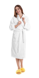 Photo of Young woman in bathrobe on white background