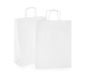 Photo of Two paper shopping bags isolated on white