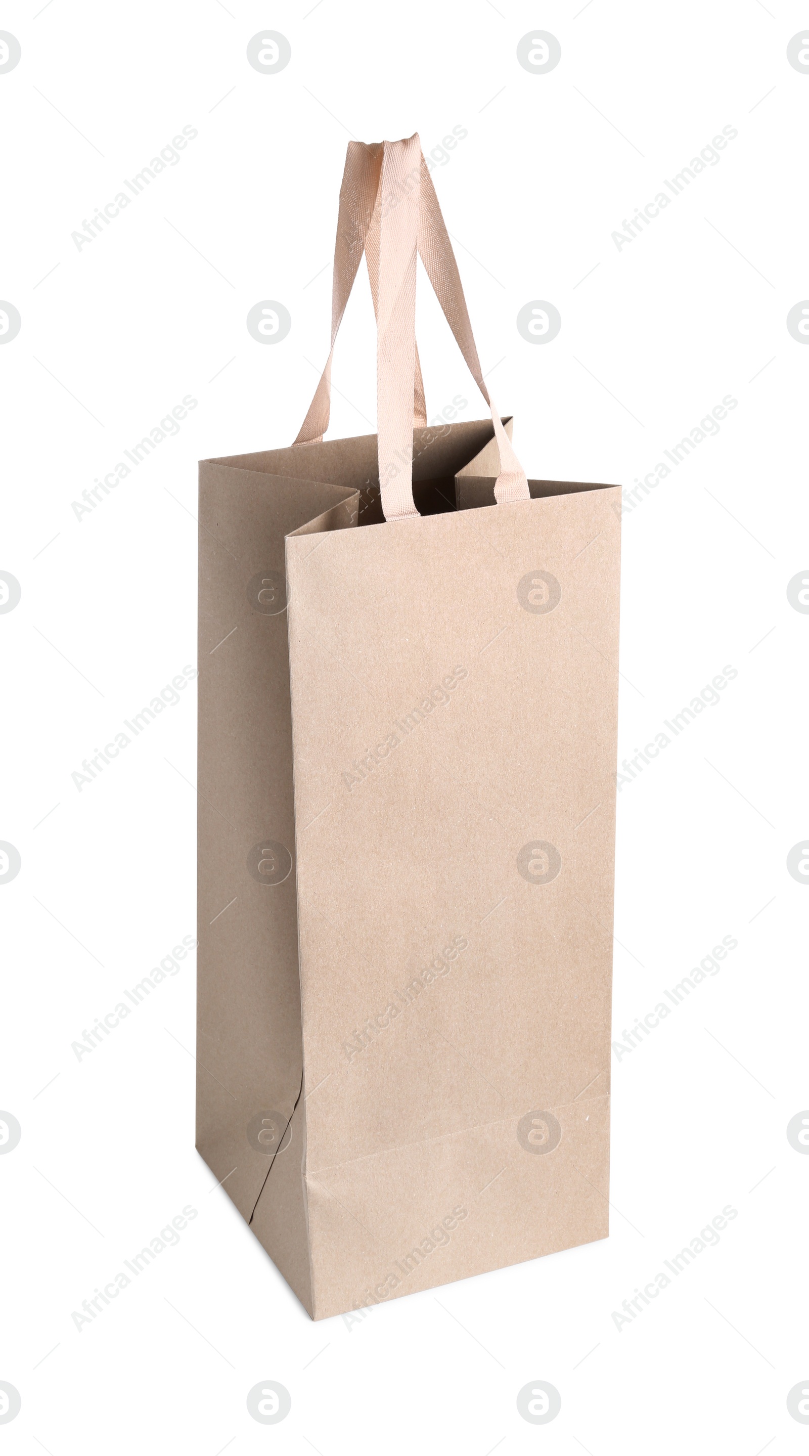 Photo of One paper bag isolated on white. Mockup for design