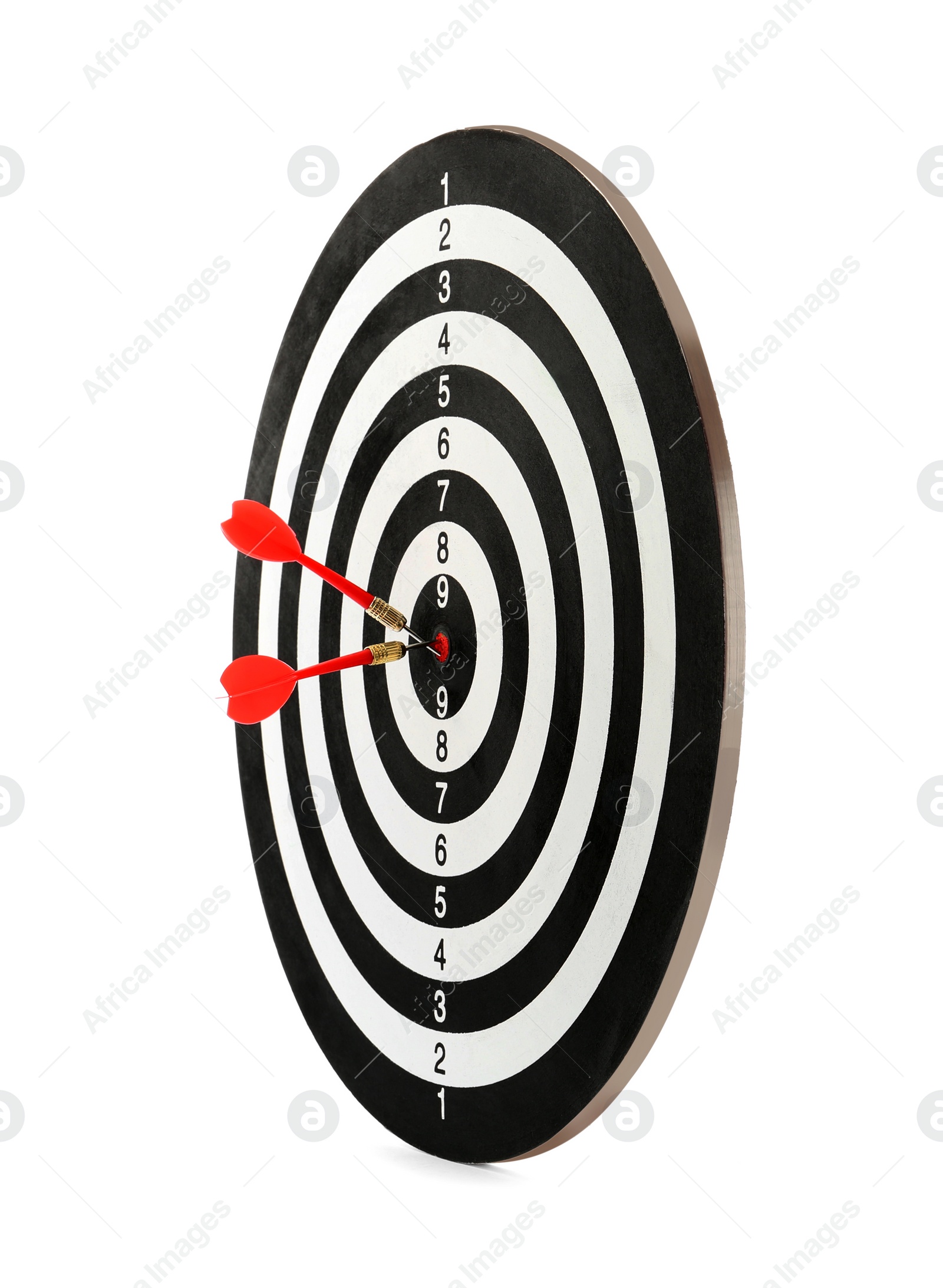 Photo of Red arrows hitting target on dart board against white background