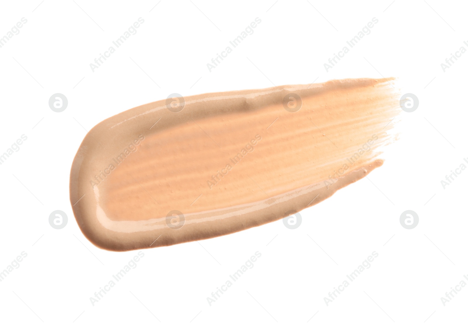 Photo of Smear of liquid skin foundation isolated on white, top view