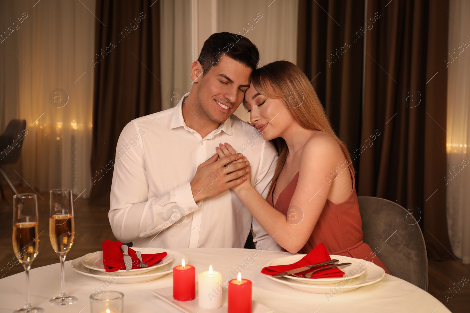 Photo of Lovely couple having romantic dinner in restaurant