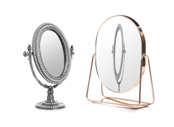 Image of Vintage desk mirror and reflection on white background