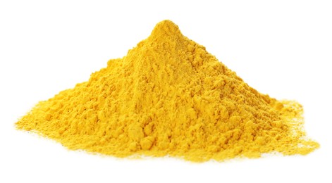 Photo of Yellow powder dye on white background. Holi festival