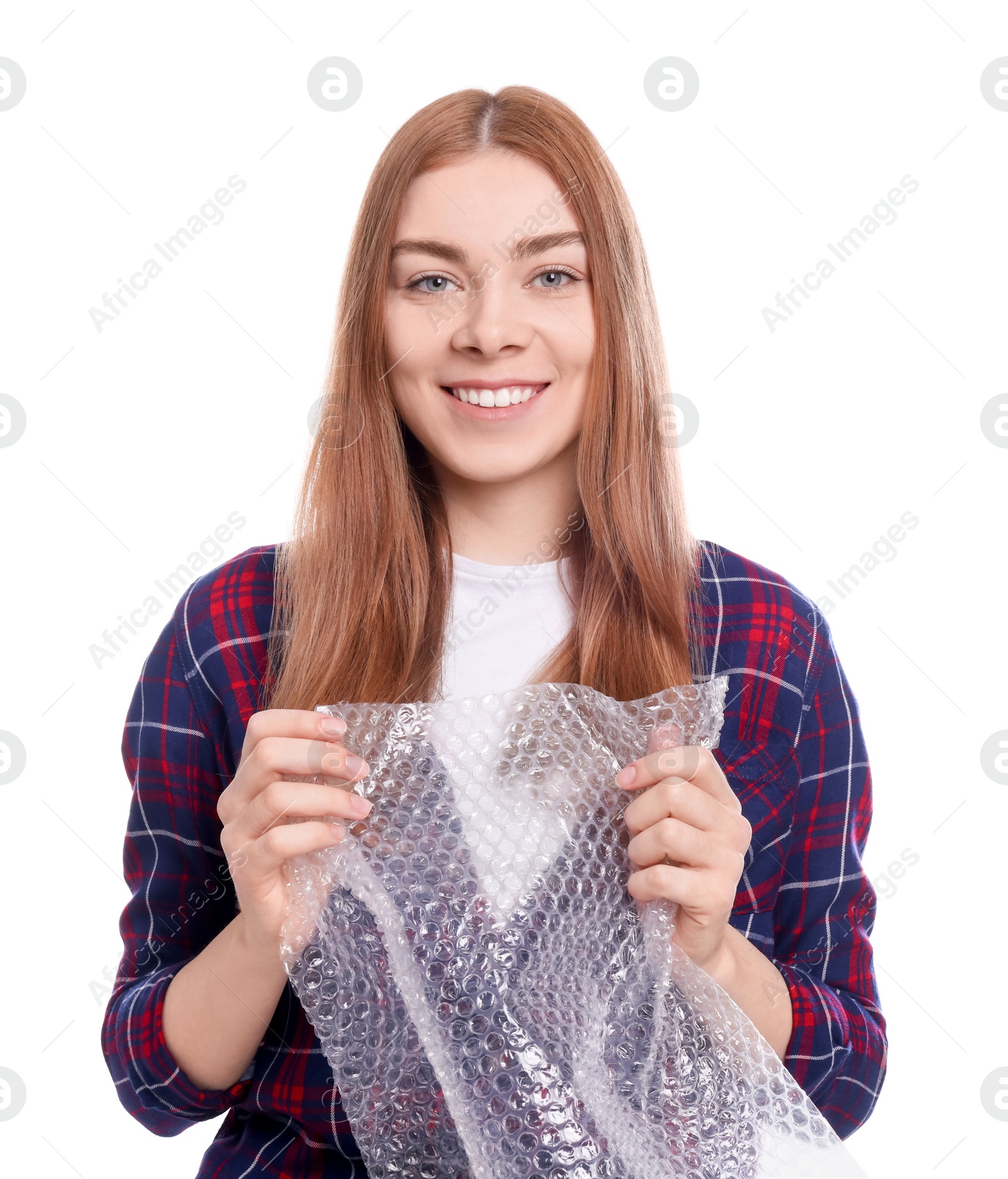 Photo of Woman popping bubble wrap on white background. Stress relief