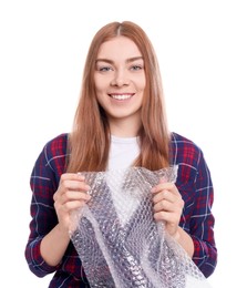 Woman popping bubble wrap on white background. Stress relief