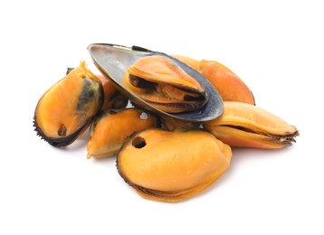 Photo of Heap of delicious cooked mussels on white background
