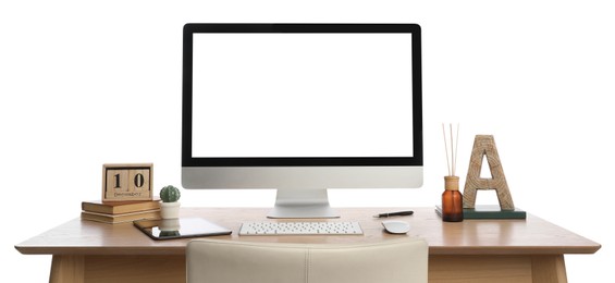 Photo of Wooden table with modern computer, decor and stationery on white background