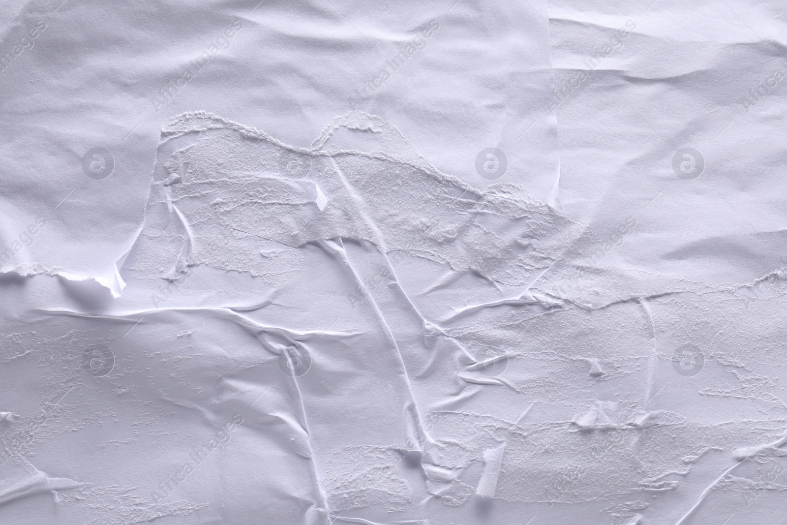 Photo of Texture of white creased paper as background, top view. Wall poster