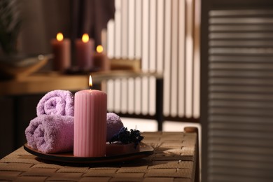 Photo of Beautiful composition with different spa products on wicker bench indoors, space for text