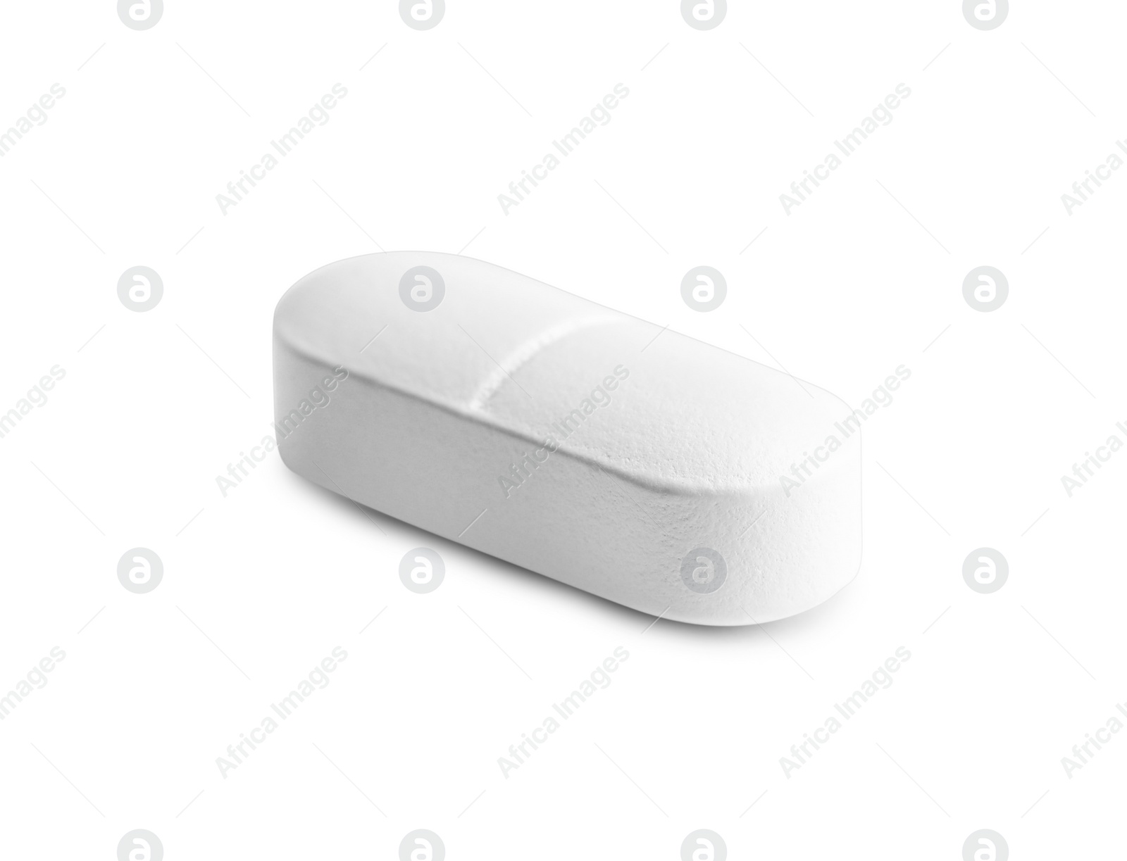 Photo of One pill on white background. Medicinal treatment