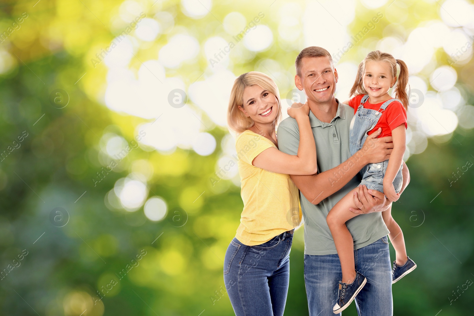 Image of Happy family with child outdoors on sunny day, space for text