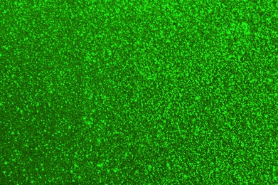 Image of St. Patrick day. Green glitter as background