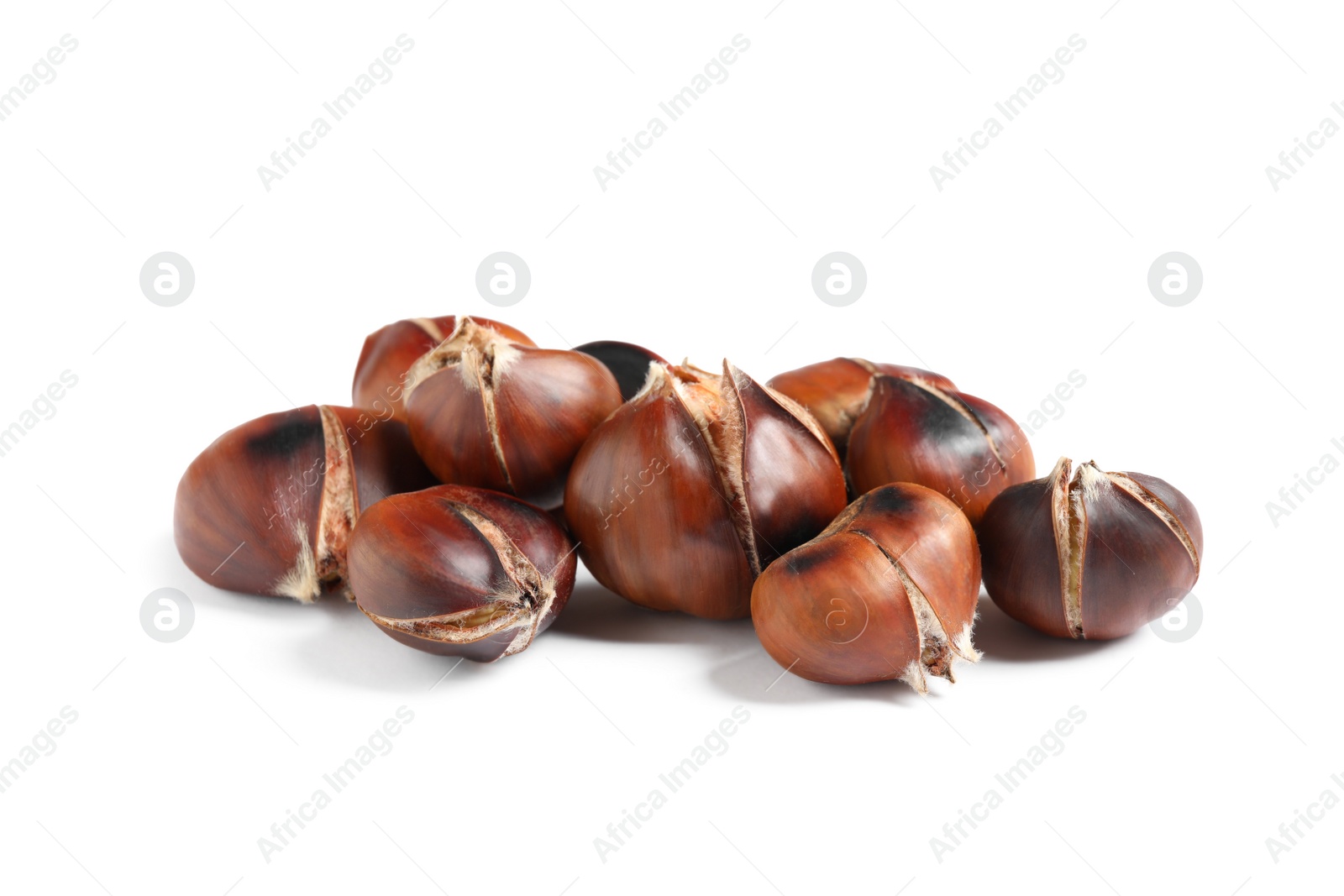 Photo of Delicious sweet roasted edible chestnuts isolated on white