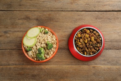 Pet food and natural ingredients on wooden table, flat lay