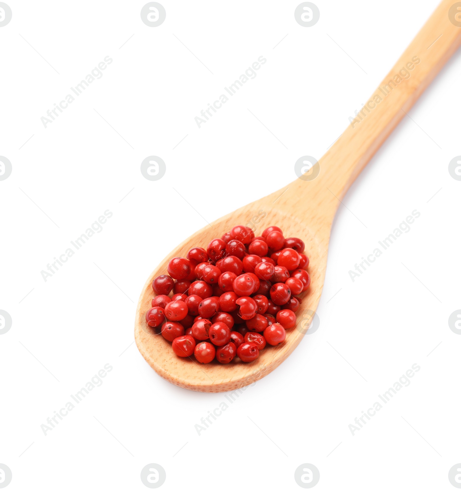 Photo of Aromatic spice. Red pepper in spoon isolated on white