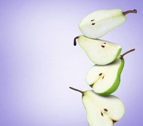 Image of Cut fresh ripe pears on blue violet gradient background, space for text