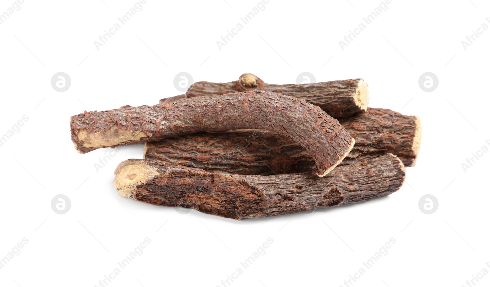 Photo of Dried sticks of liquorice root on white background